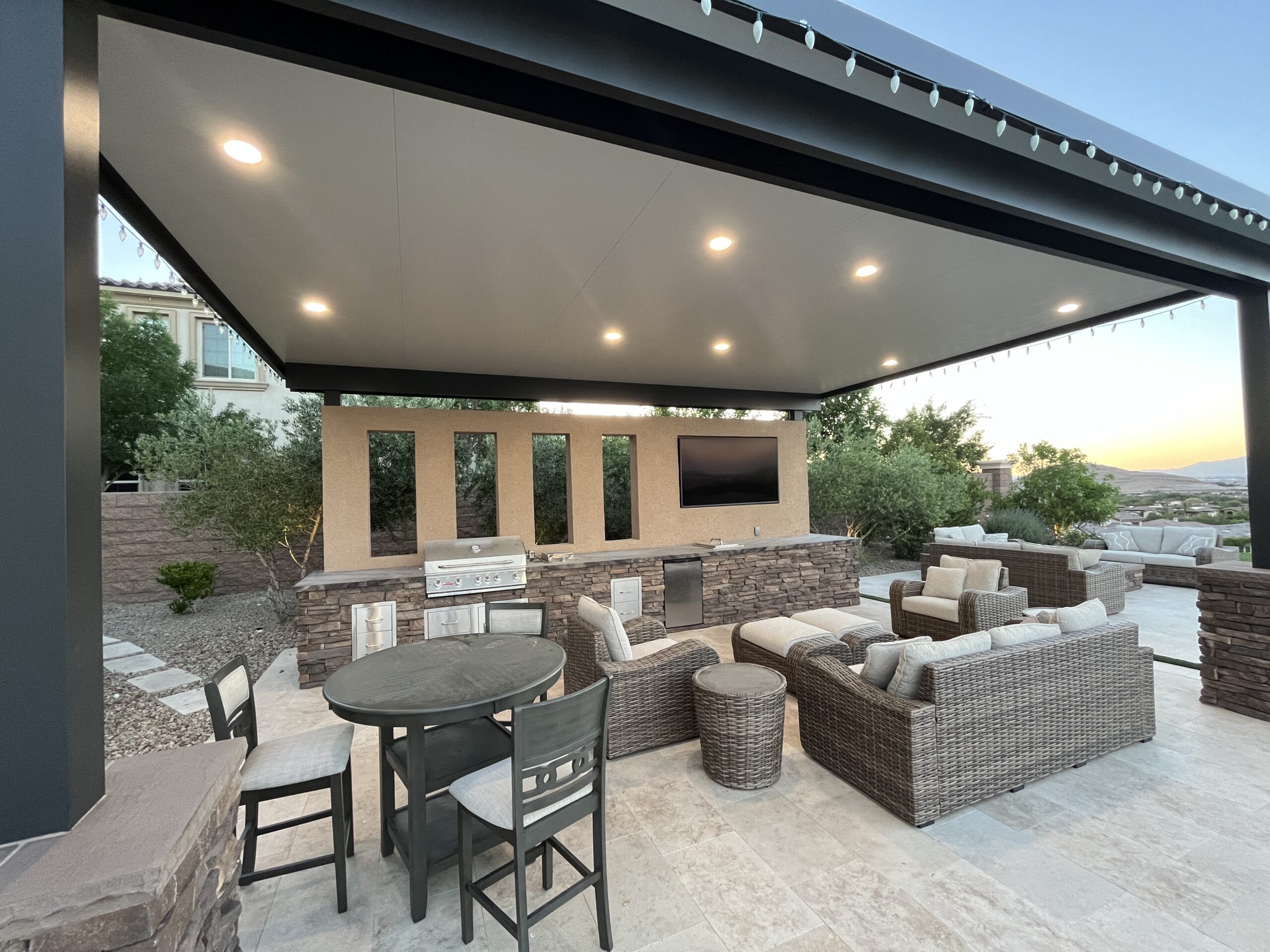 A patio with a couch, table and chairs. A patio with a couch, table and chairs.